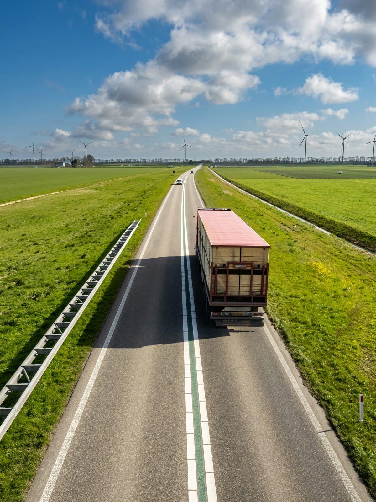 Aerial view of a truck on a rural road