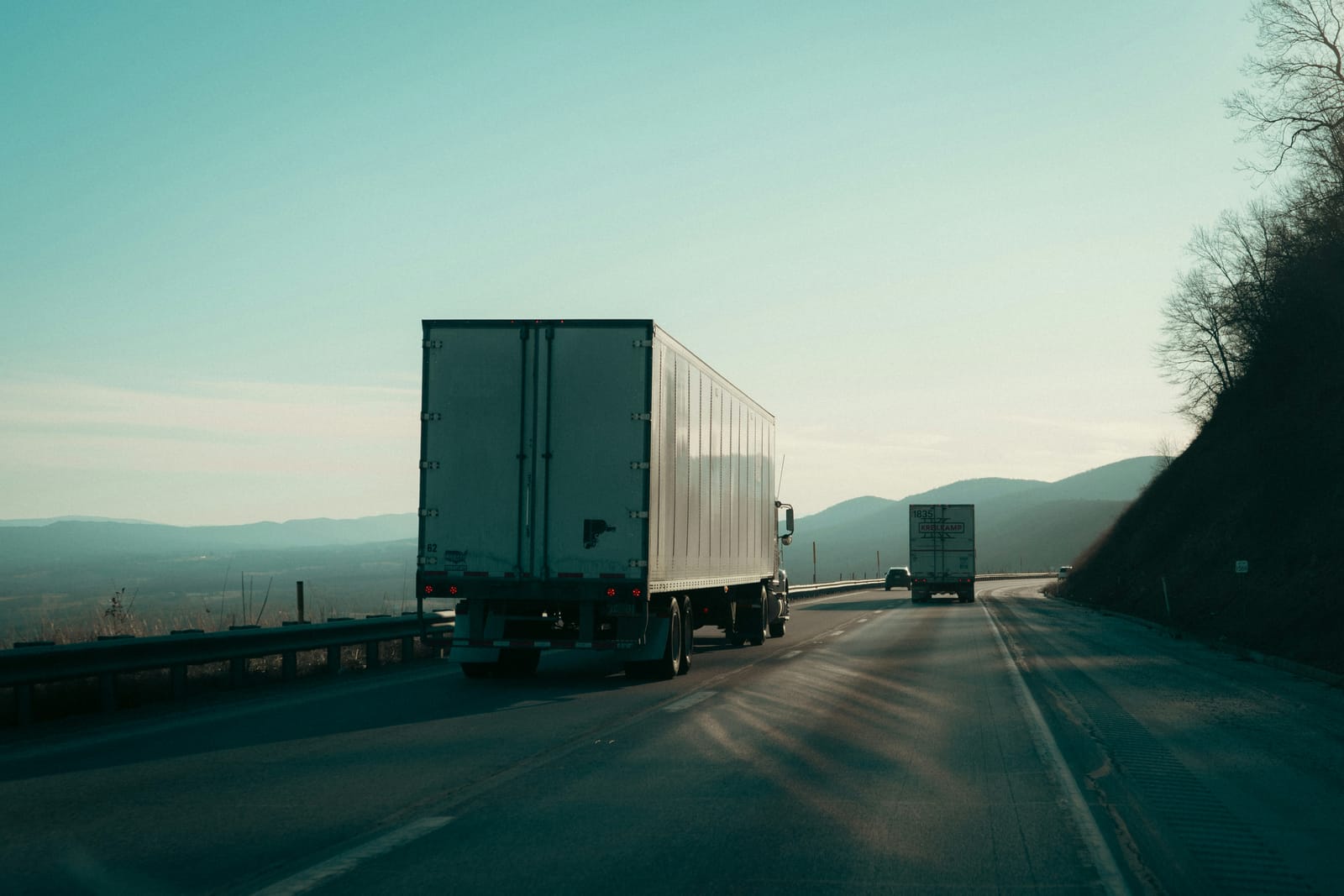 Semi-trucks on a US mountain highway